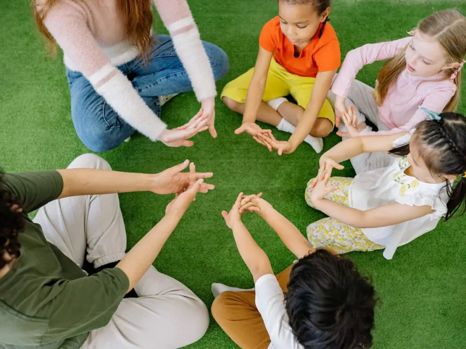 Group of children sitting in a circle